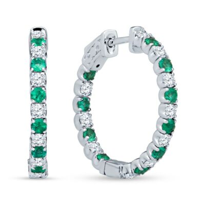 a pair of emerald and diamond hoop earrings