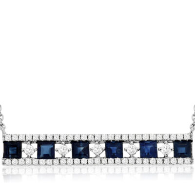 a blue and white diamond necklace on a chain