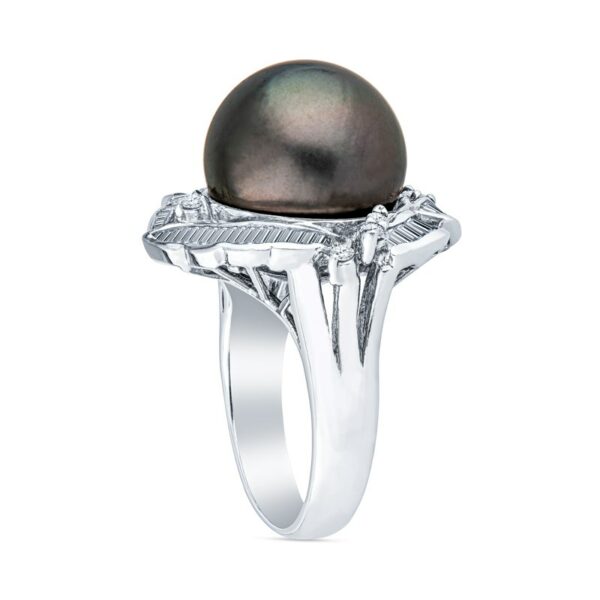 a ring with a black pearl in the center