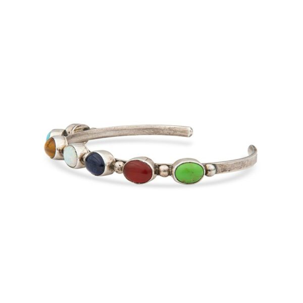 a silver bracelet with multi colored stones