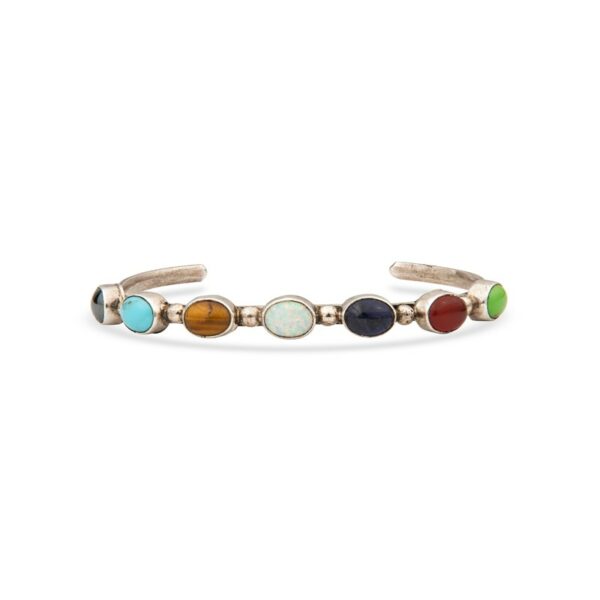 a gold bracelet with five different colored stones