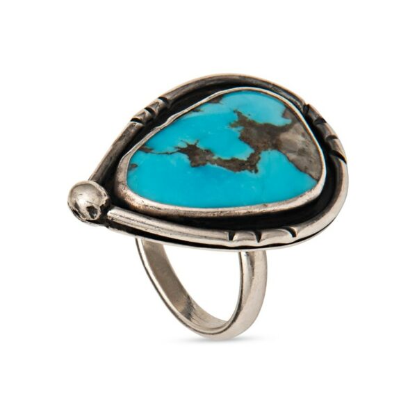 a ring with a turquoise stone in the middle