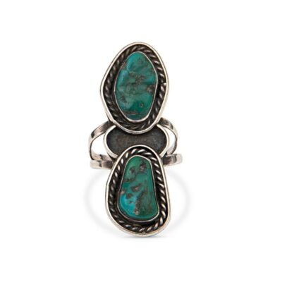 two turquoise stone rings on a white background
