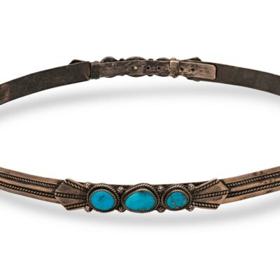 a belt with two turquoise stones on it
