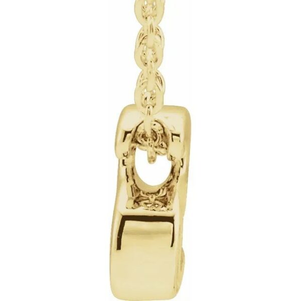 a gold charm with a chain attached to it