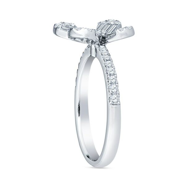 a white gold engagement ring with an oval shaped diamond