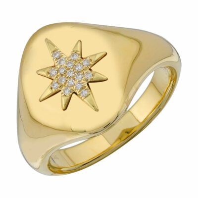 a gold ring with a star on it