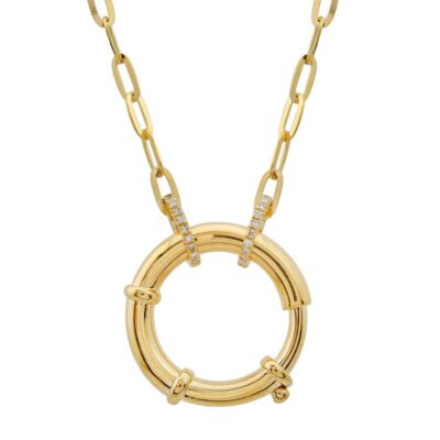 a gold necklace with a circle and two small diamonds