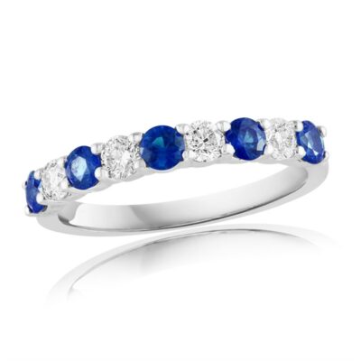 a white gold ring with blue sapphire and diamonds