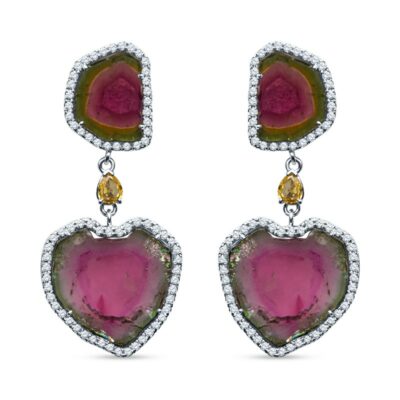 a pair of earrings with pink and yellow stones