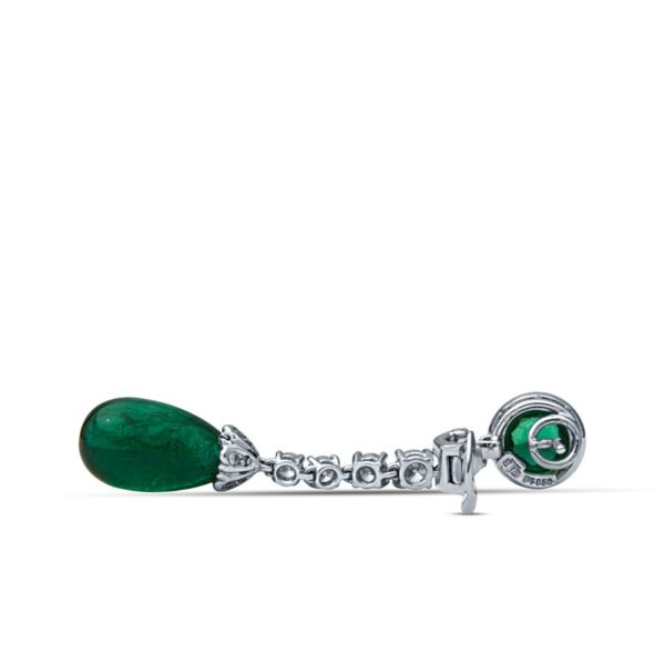 a green stone with the word love on it