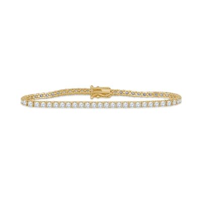 a yellow gold bracelet with rows of diamonds