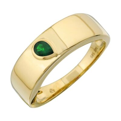 a gold ring with a green stone